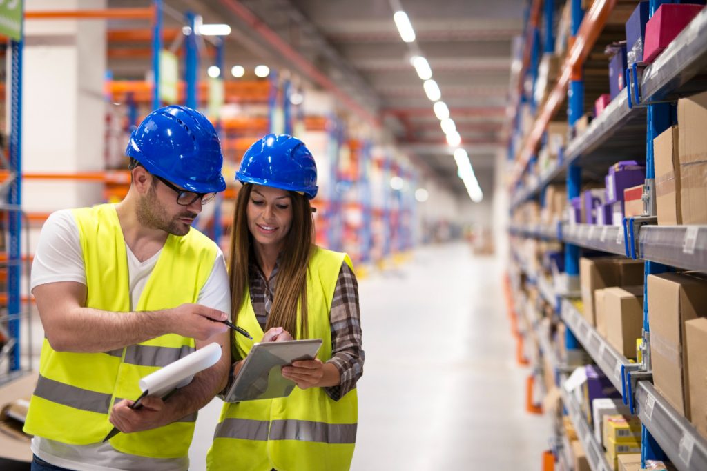 warehouse-workers-checking-inventory-consulting-each-other-about-organization-distribution-goods-1-1024x683