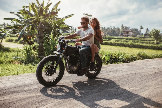 young-couple-riding-motorbike-2021-08-26-19-58-25-utc (1)