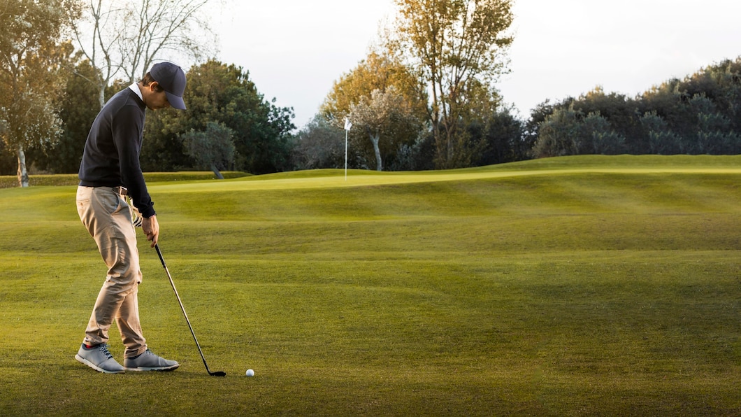 side-view-man-grassy-golf-field_23-2148822986