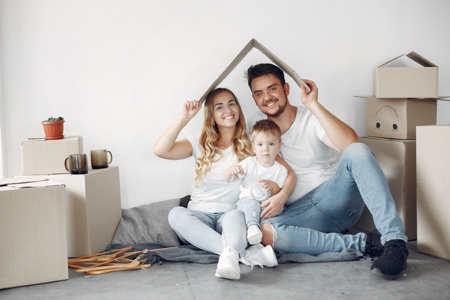 family-moving-using-boxes-1